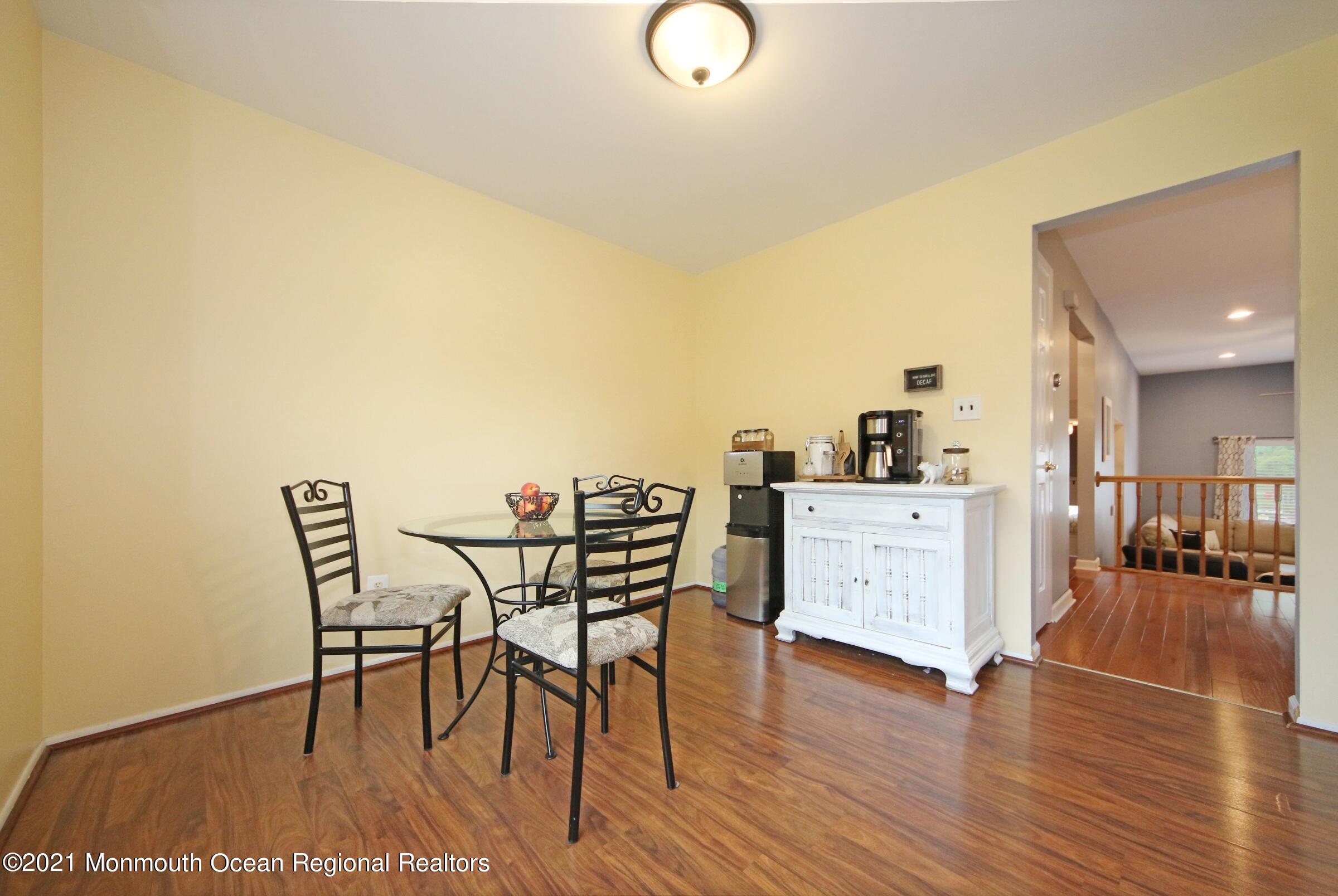 373 Middlewood Road Middletown, NJ 07748 - Photo 13 of 28 a view of a dining room with furniture and wooden floor