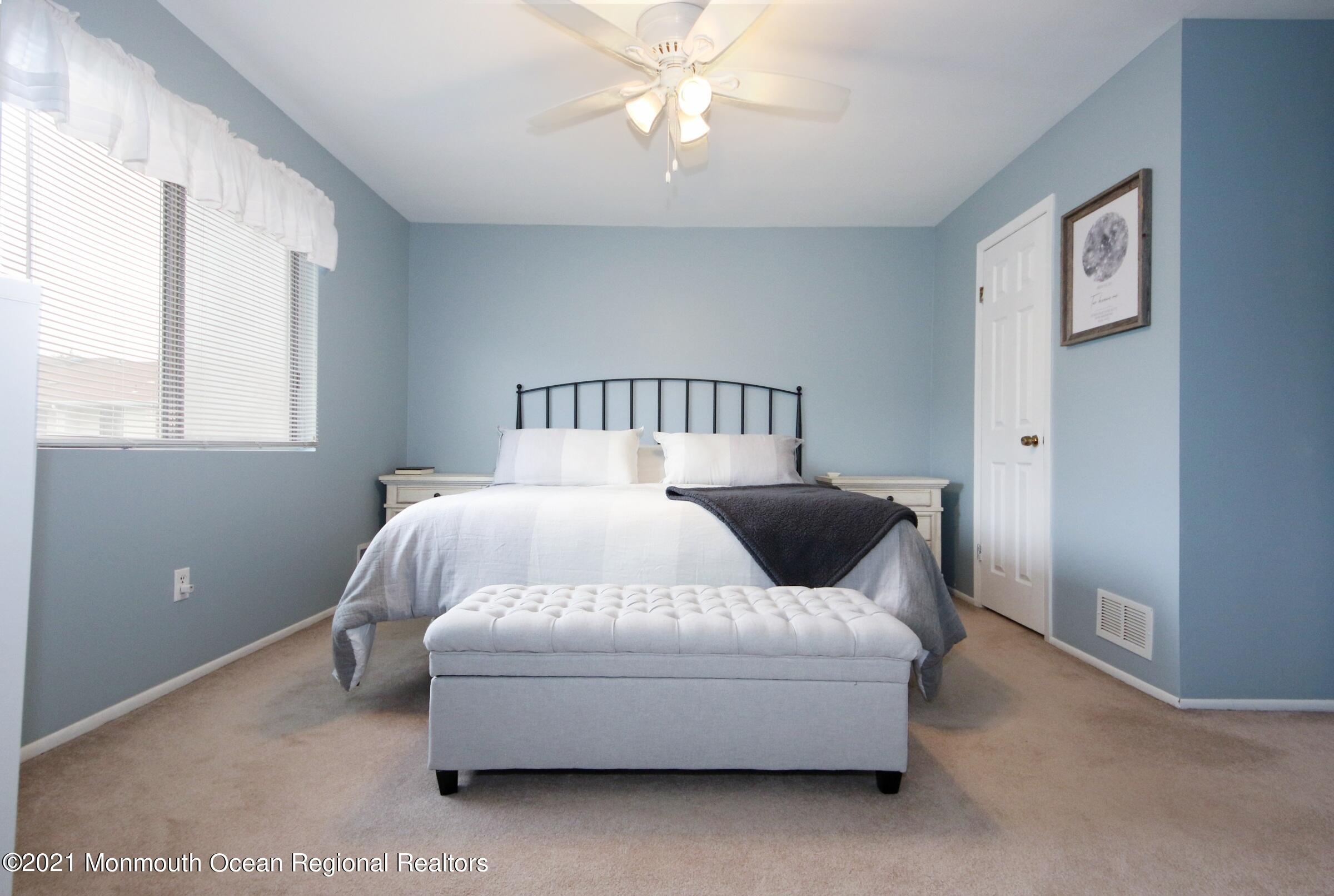 373 Middlewood Road Middletown, NJ 07748 - Photo 16 of 28 a bedroom with a bed and window