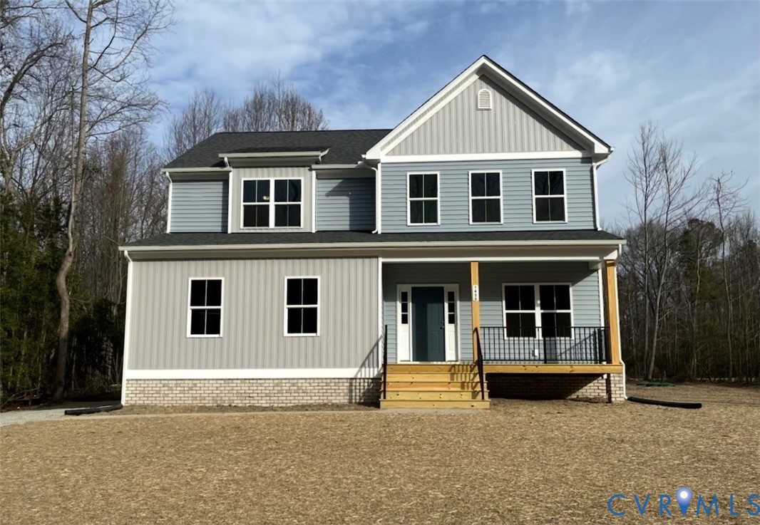 1430 Tutelo Road Quinton, VA 23141 - Photo 2 of 3 a front view of a house with garage