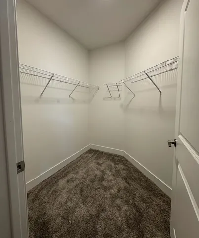 a bathroom with a toilet sink and shower