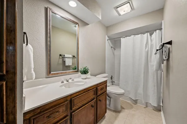 a view of a hallway with washer and dryer
