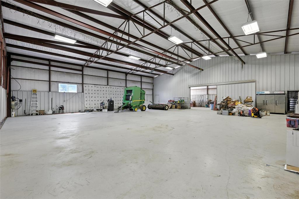 12370 Fortenberry Road Sanger, TX 76266 - Photo 8 of 40 Garage with metal wall