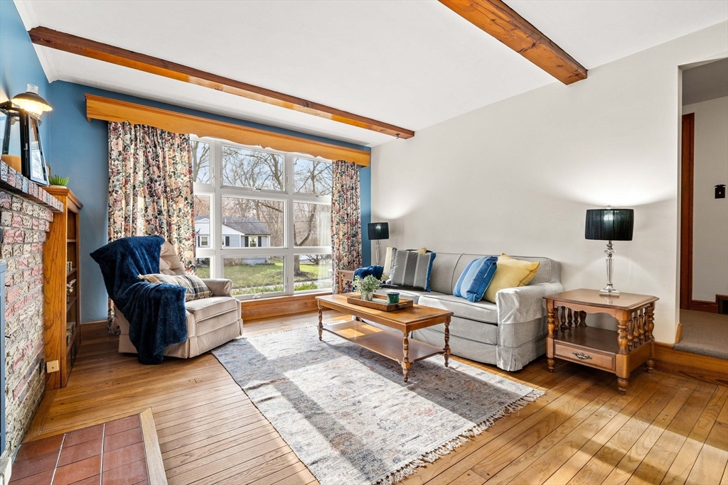 1 Ledgewood Road Wilmington, MA 01887 - Photo 11 of 36 a living room with furniture and a large window