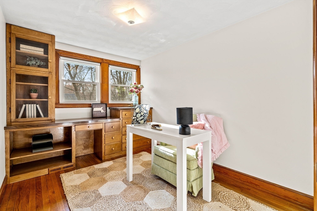 1 Ledgewood Road Wilmington, MA 01887 - Photo 13 of 36 a view of a workspace with furniture and a window