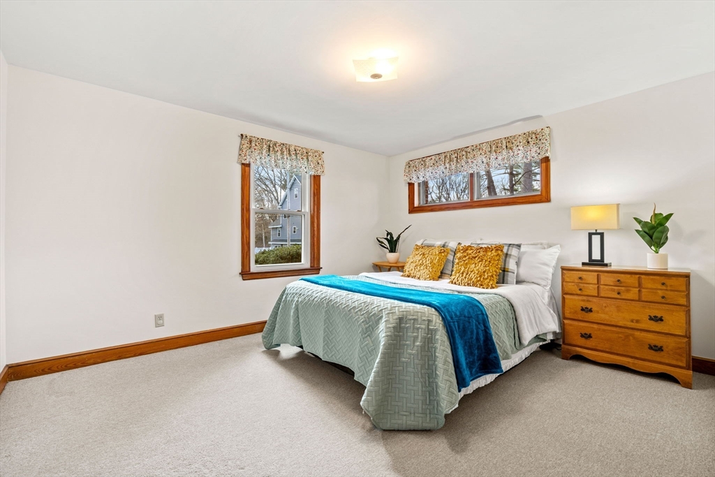 1 Ledgewood Road Wilmington, MA 01887 - Photo 15 of 36 a bedroom with a bed and a window