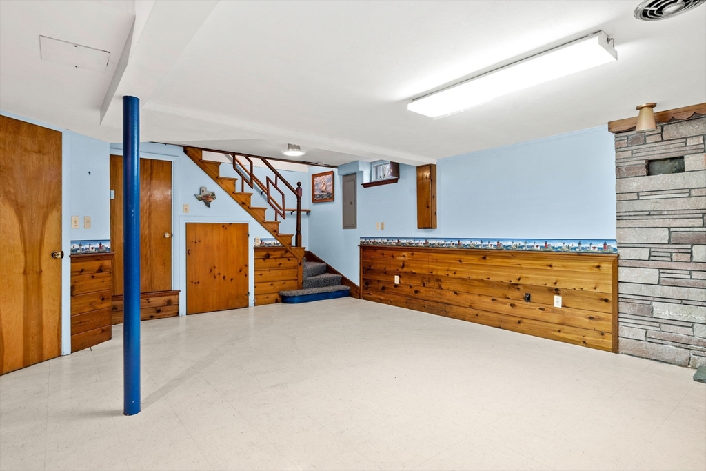 1 Ledgewood Road Wilmington, MA 01887 - Photo 25 of 36 a view of an empty room with stairs