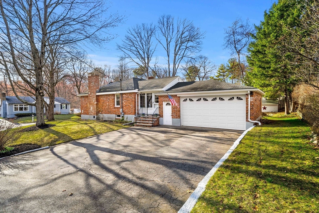 1 Ledgewood Road Wilmington, MA 01887 - Photo 33 of 36 a view of a house with pool and a yard