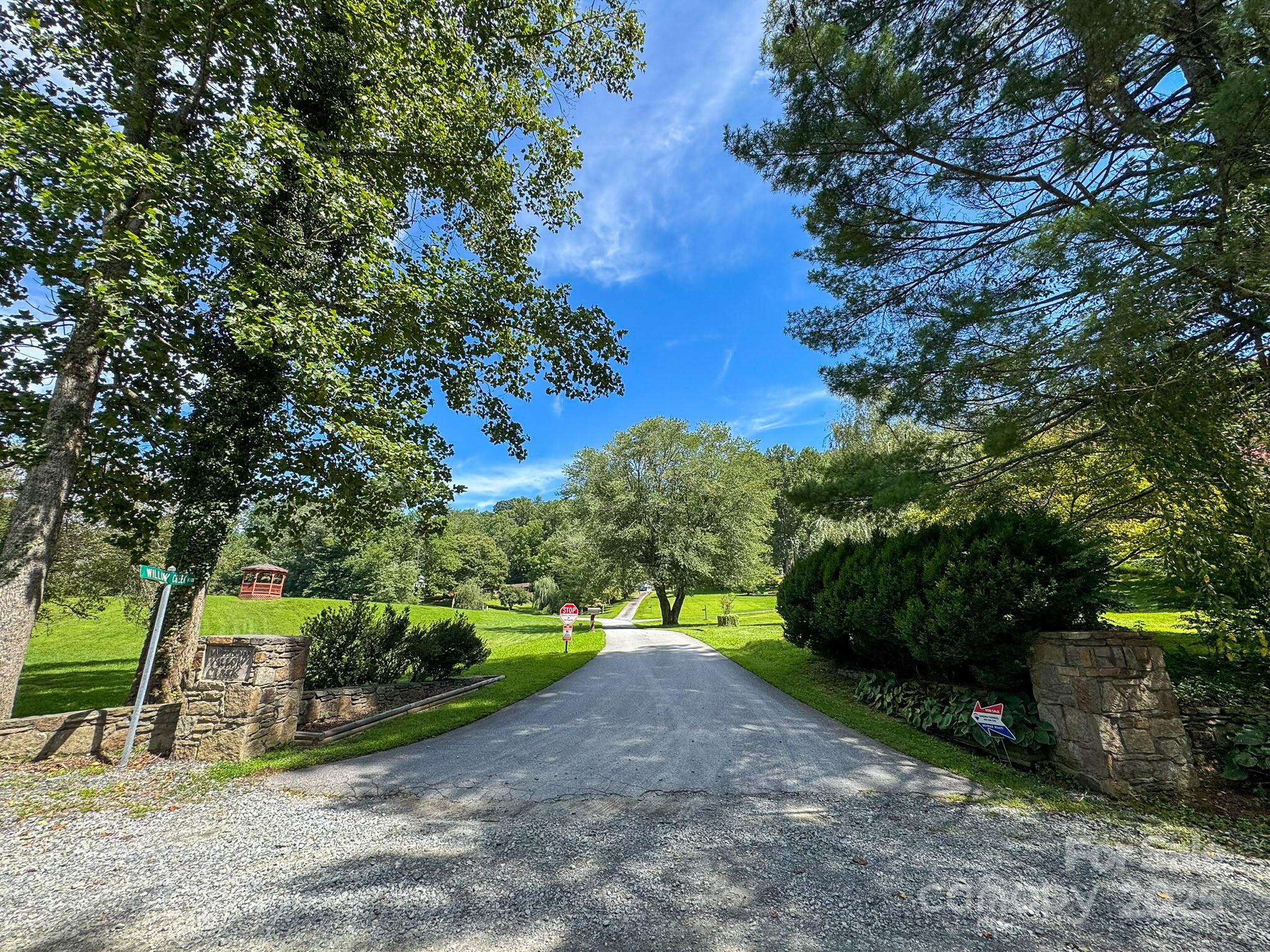 0 Spring Road, Unit 6 Hendersonville, NC 28739 - Photo 20 of 30 a view of a park with large trees