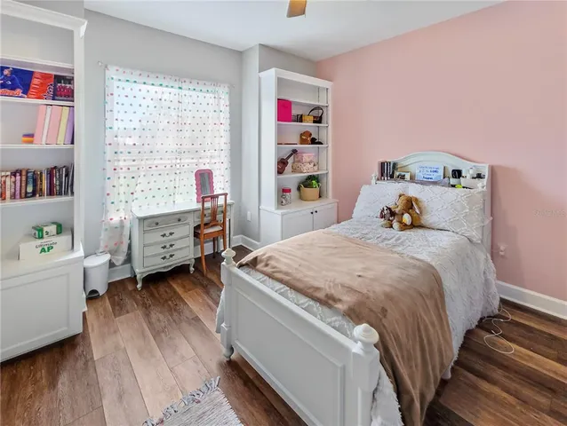 a bedroom with a bed and a closet