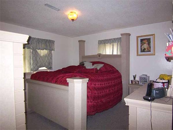 3 Norfolk Street Springfield, MA 01109 - Photo 11 of 15 a bed room with a bed and a window