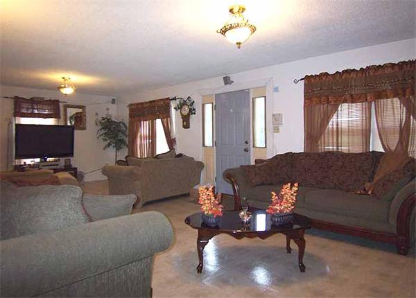 3 Norfolk Street Springfield, MA 01109 - Photo 2 of 15 a living room with furniture and a chandelier