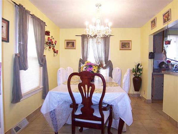 3 Norfolk Street Springfield, MA 01109 - Photo 5 of 15 a view of a dining room with furniture and chandelier