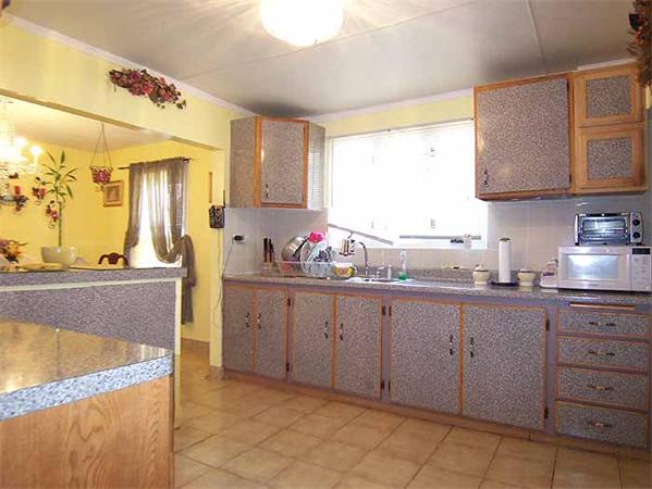 3 Norfolk Street Springfield, MA 01109 - Photo 6 of 15 a kitchen with sink cabinets and window