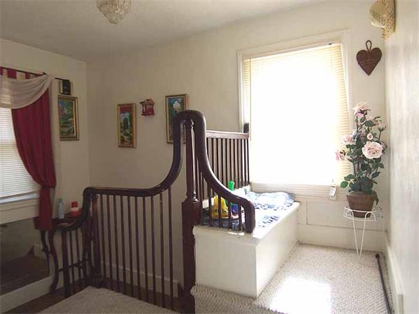3 Norfolk Street Springfield, MA 01109 - Photo 8 of 15 a bedroom with furniture and a window