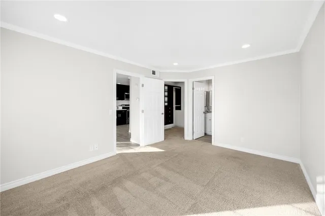a view of empty room with a ceiling fan