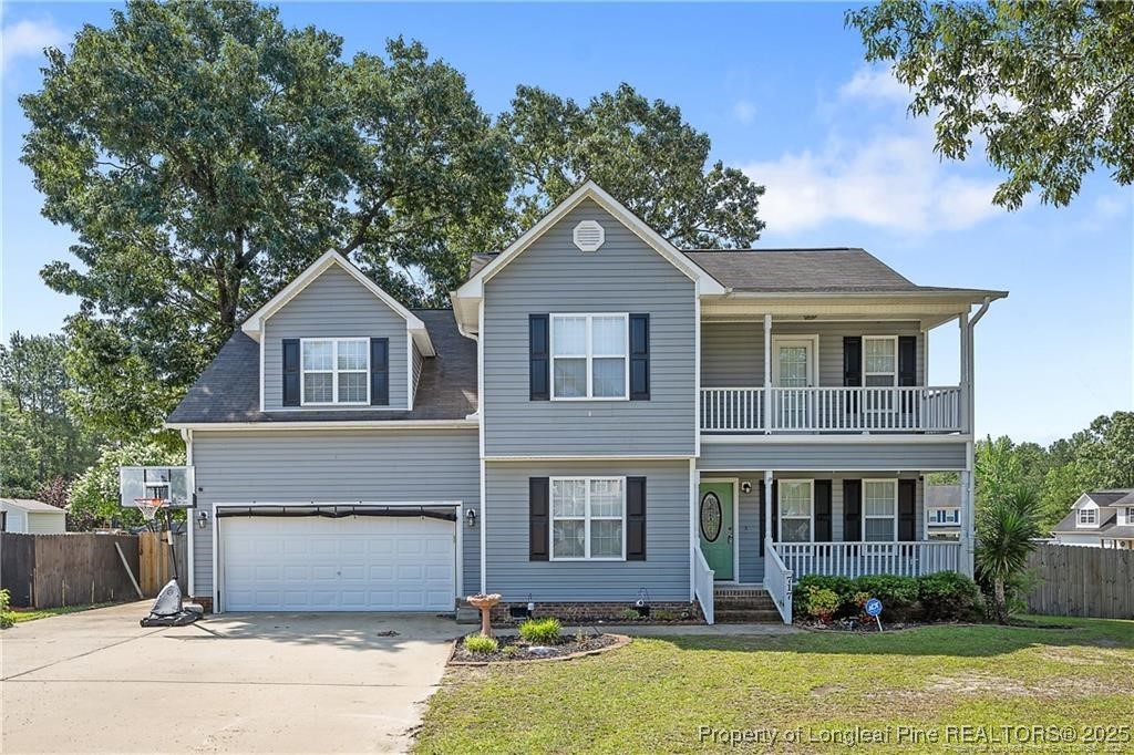 717 Lenoir Drive Spring Lake, NC 28390 - Photo 2 of 47 a front view of a house with garden