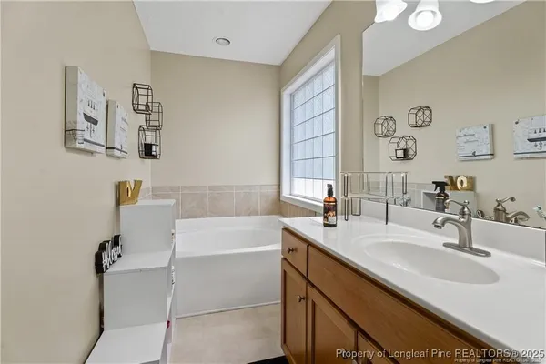 a bathroom with a sink and a bathtub