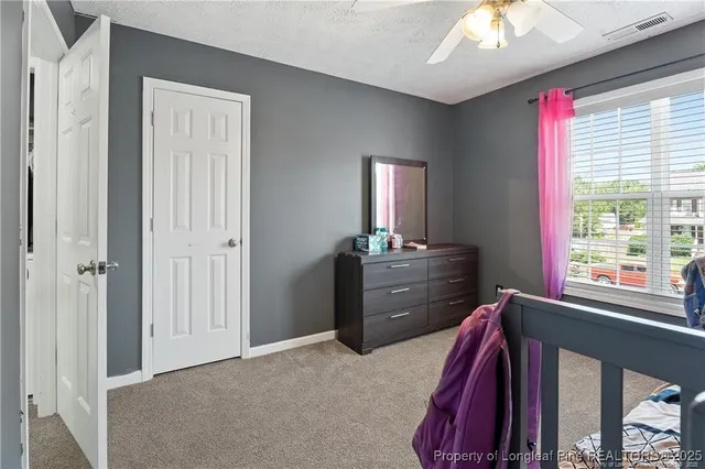 a backyard of a house with yard and seating space