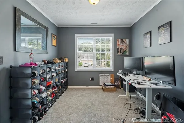 a workspace with furniture and window
