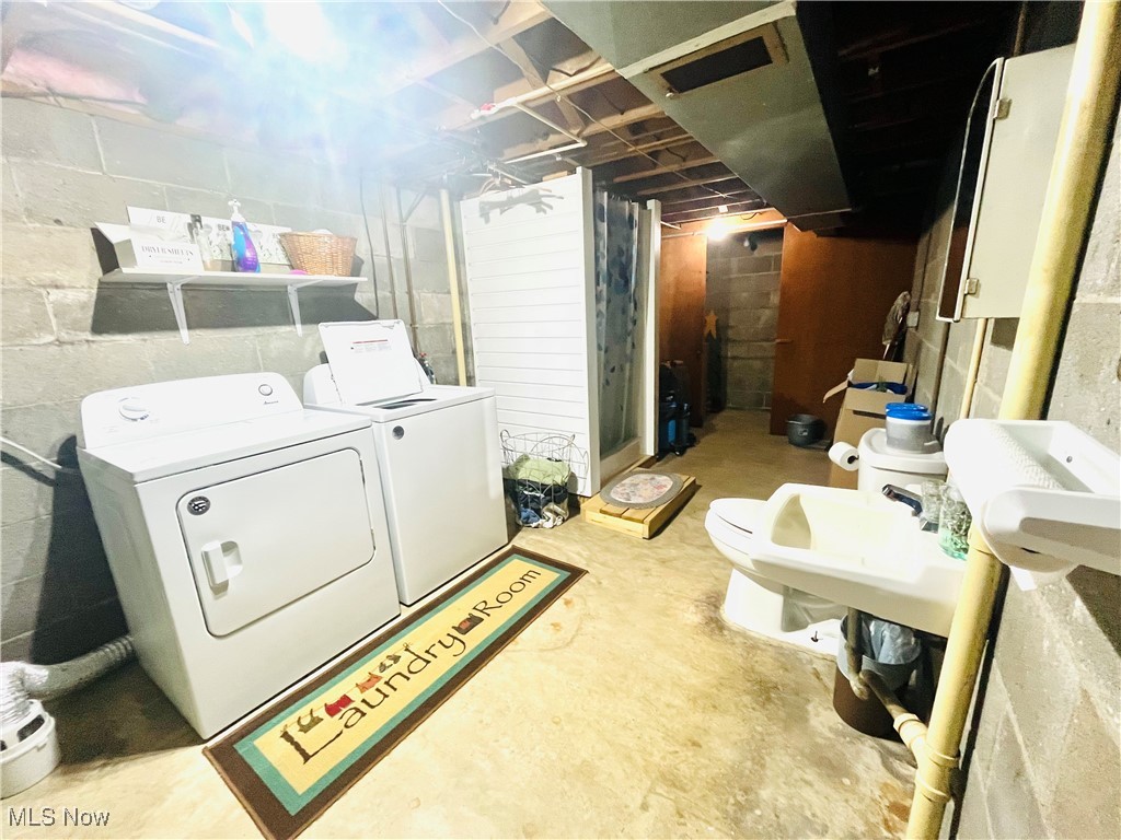 91070 Kilgore Ridge Road Scio, OH 43988 - Photo 23 of 40 Unfinished below grade area featuring washing machine and clothes dryer