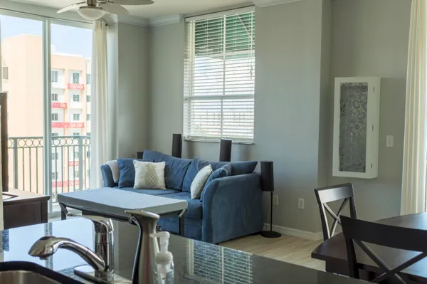 a living room with furniture and a window