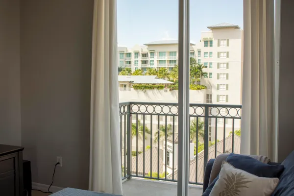 a view of a city from a corridor