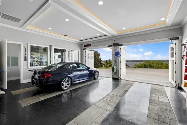 a view of an empty room and a window