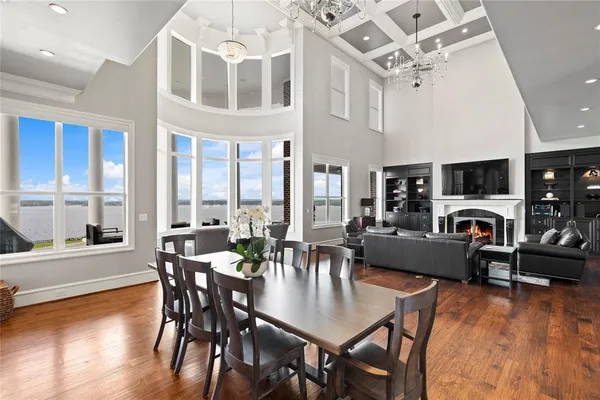 a living room with furniture fireplace and flat screen tv