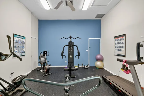 a view of a swimming pool with an outdoor seating