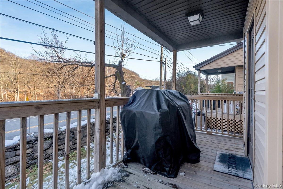 10 Spartan Place, Unit B Tuxedo Park, NY 10987 - Photo 22 of 27 a view of a two chairs in the balcony