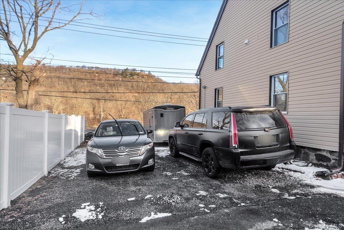 10 Spartan Place, Unit B Tuxedo Park, NY 10987 - Photo 24 of 27 a car parked in garage