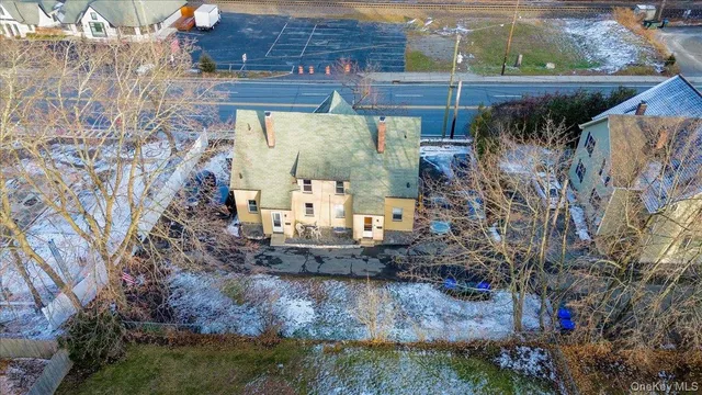 a view of a balcony with a yard
