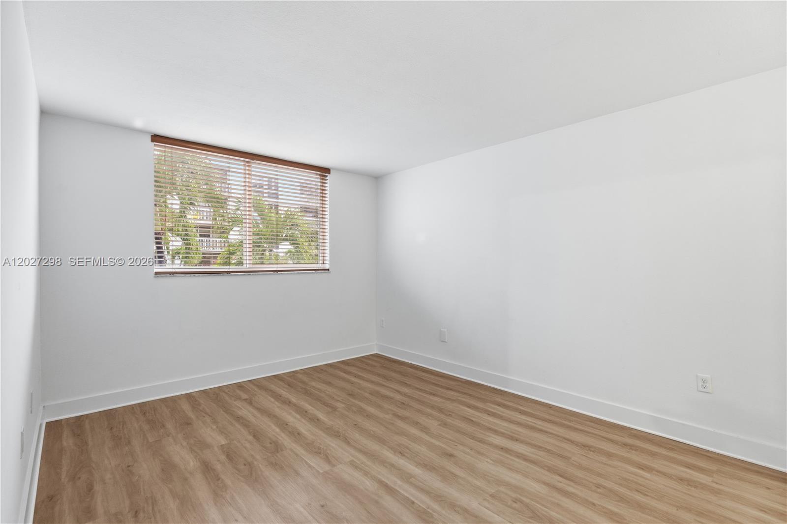 1665 Bay Road, Unit 322 Miami Beach, FL 33139 - Photo 10 of 24 an empty room with a window
