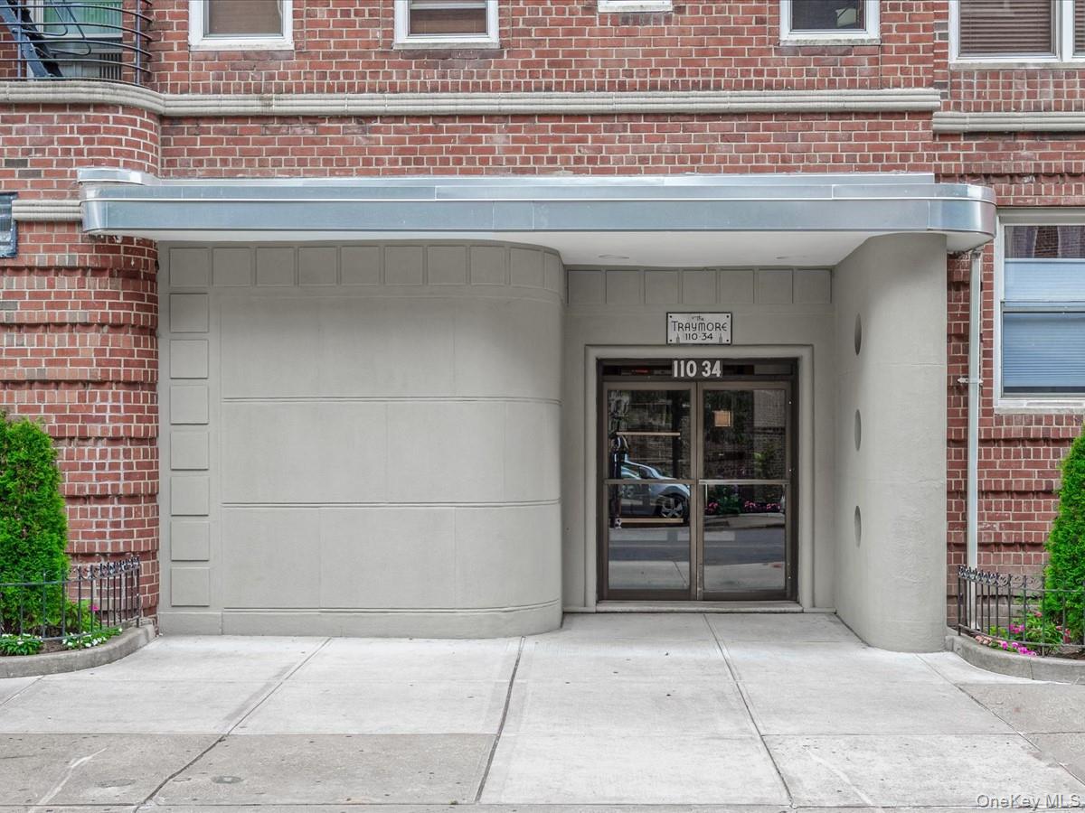 11034 73rd Road, Unit 4F Queens, NY 11375 - Photo 1 of 1 View of exterior entry with brick siding