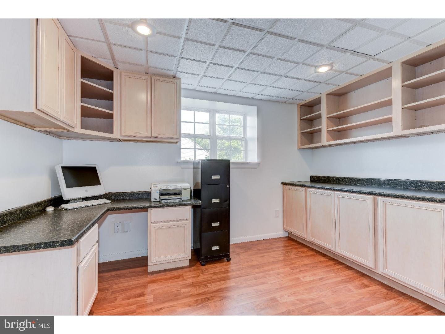 652 Melvin Road Telford, PA 18969 - Photo 14 of 25 a kitchen with stainless steel appliances granite countertop a stove a sink and a microwave