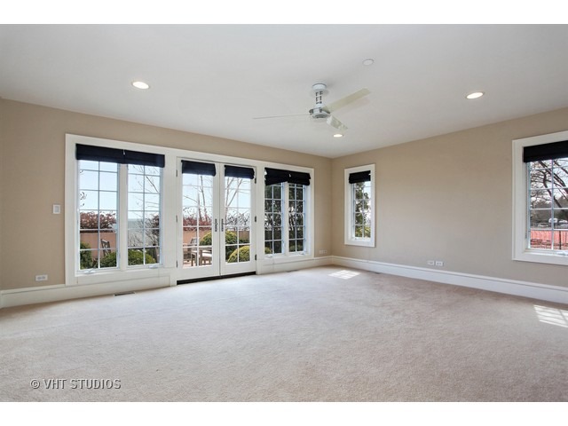 1203 Whitebridge Hill Road Winnetka, IL 60093 - Photo 12 of 24 a view of an empty room with a window