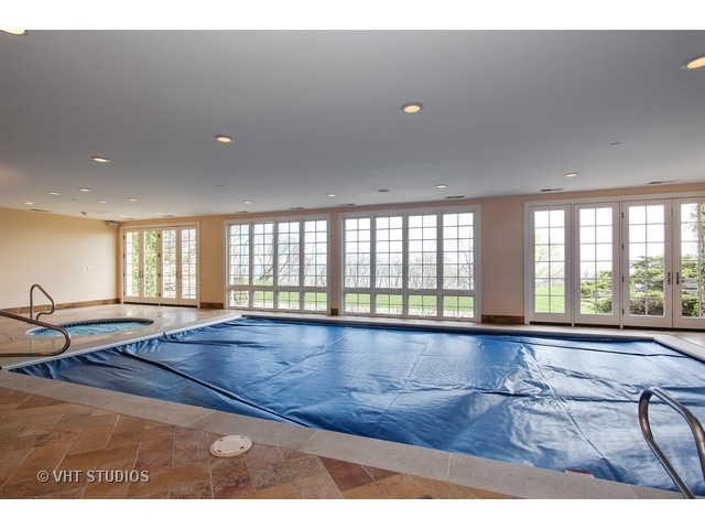 1203 Whitebridge Hill Road Winnetka, IL 60093 - Photo 15 of 24 a view of empty room with wooden floor and fan
