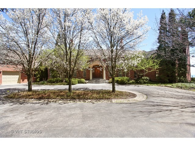 1203 Whitebridge Hill Road Winnetka, IL 60093 - Photo 24 of 24 a street view with large trees