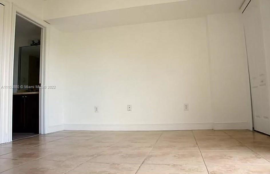120 South Douglas Road, Unit 306 Miami, FL 33134 - Photo 11 of 17 a view of an empty room