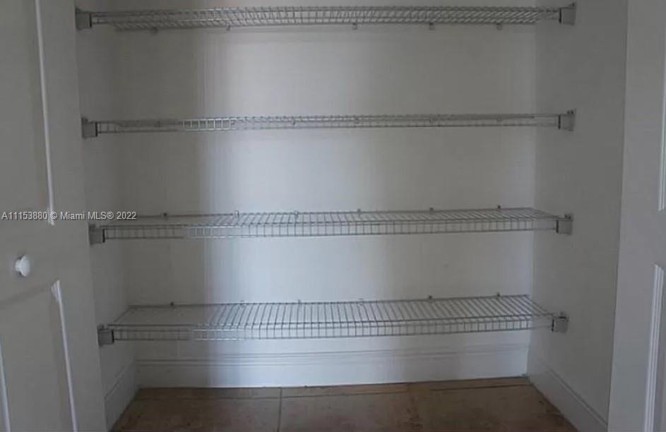 120 South Douglas Road, Unit 306 Miami, FL 33134 - Photo 16 of 17 a close view of cabinet