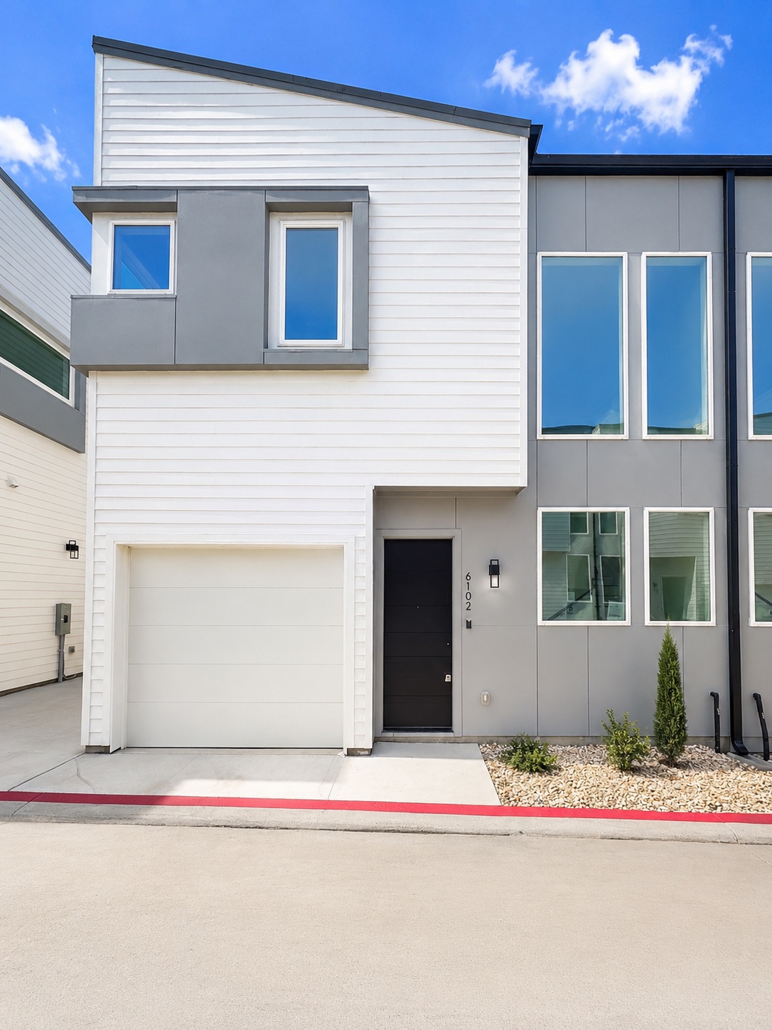 2000 Riverside Farms Road, Unit 6102 Austin, TX 78741 - Photo 1 of 11 Modern facade with sleek lines and a welcoming entryway.