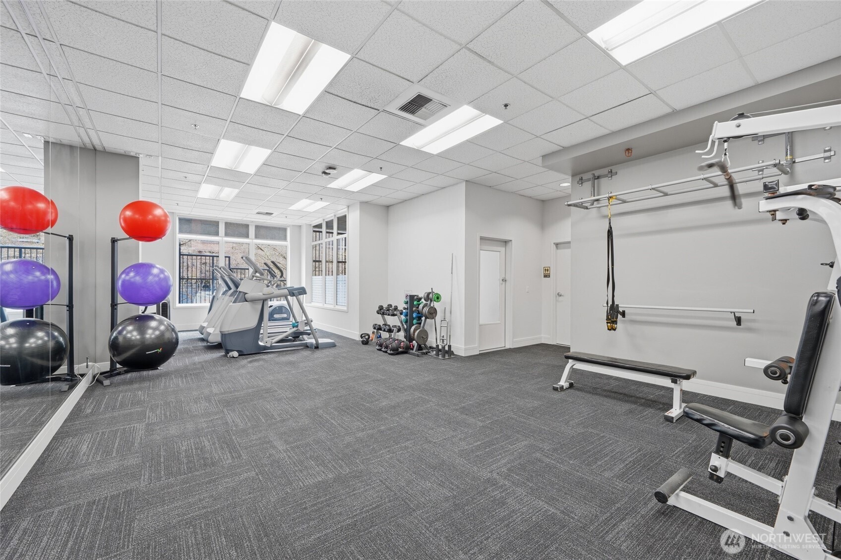 2801 1st Avenue, Unit 504 Seattle, WA 98121 - Photo 24 of 34 a view of a room with gym equipment