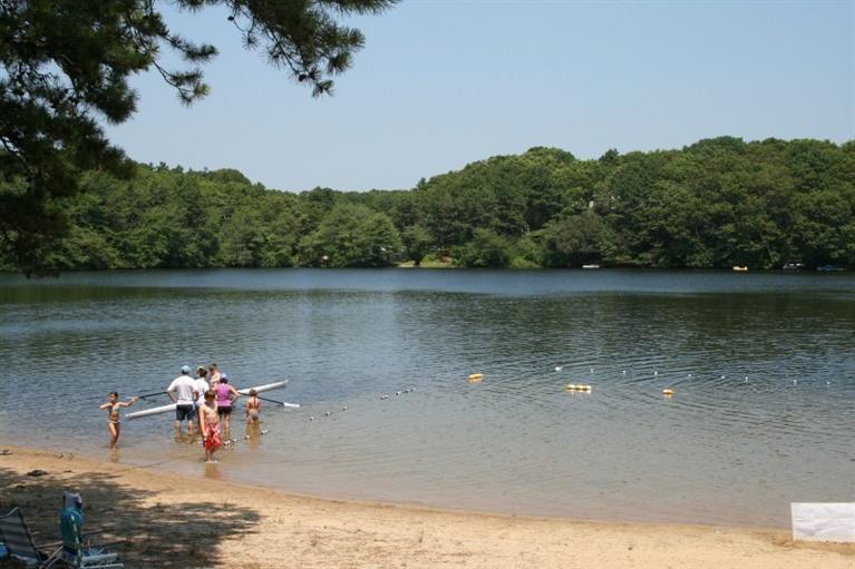 411 Lower County Road Harwich Port, MA 02646 - Photo 25 of 32 a view of a lake with a mountain in the background