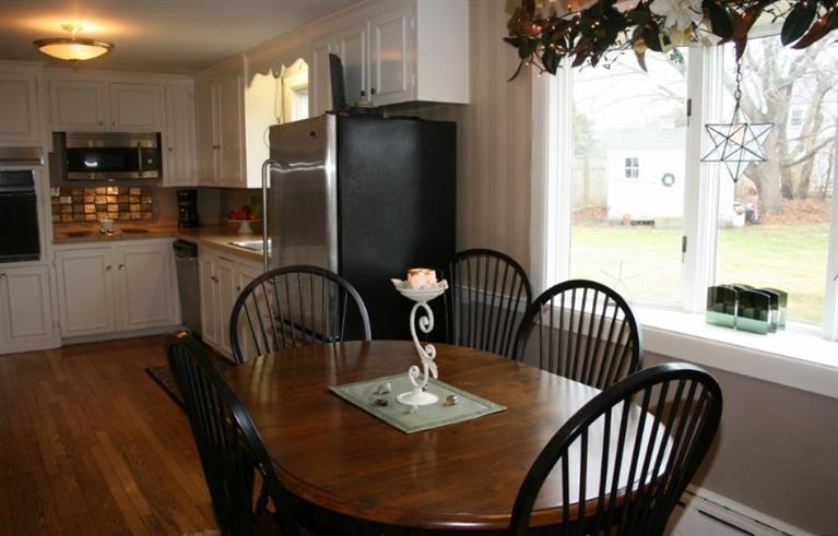 411 Lower County Road Harwich Port, MA 02646 - Photo 4 of 32 a dining room with furniture and window