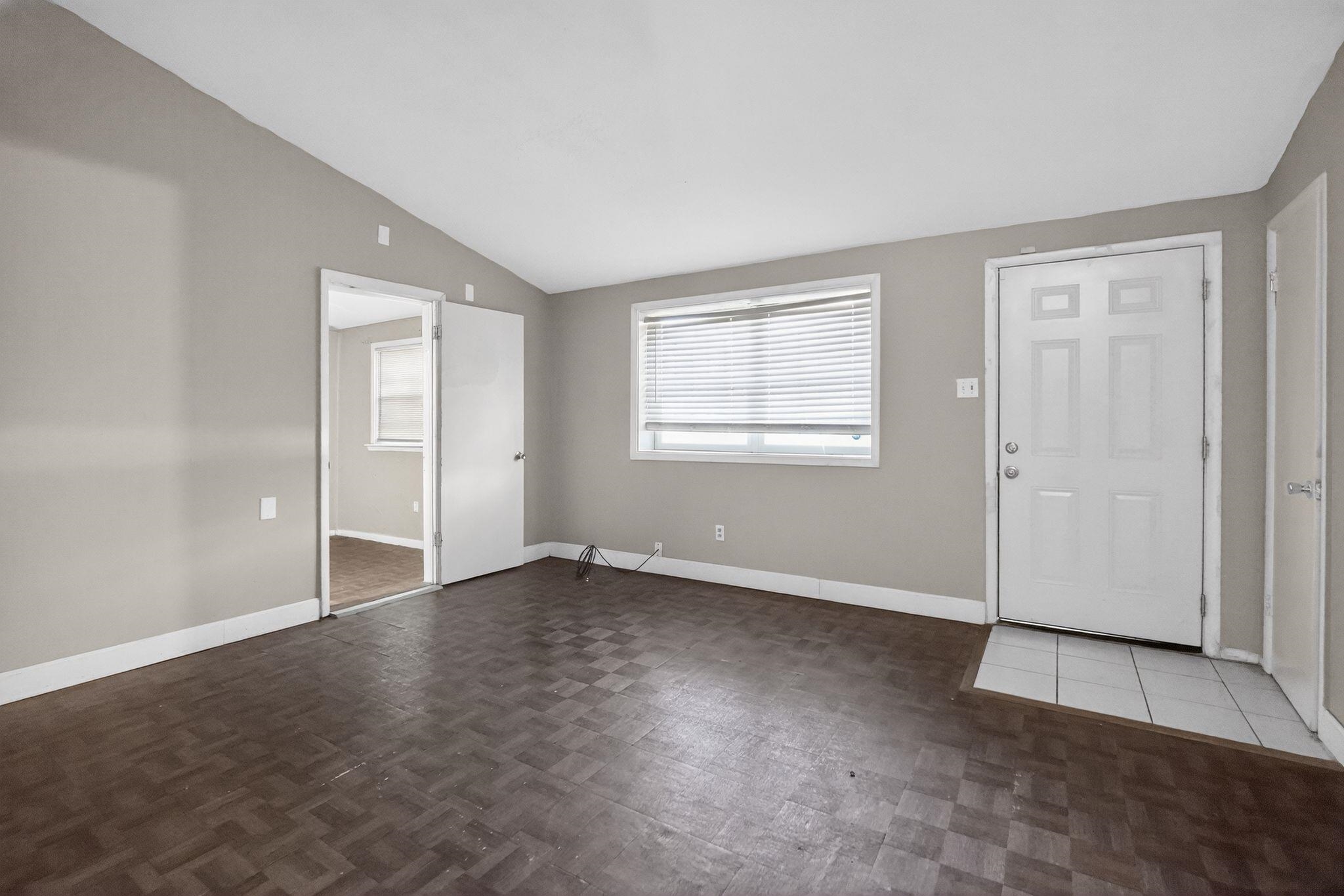 4504 Neely Road Memphis, TN 38109 - Photo 13 of 32 an empty room with windows