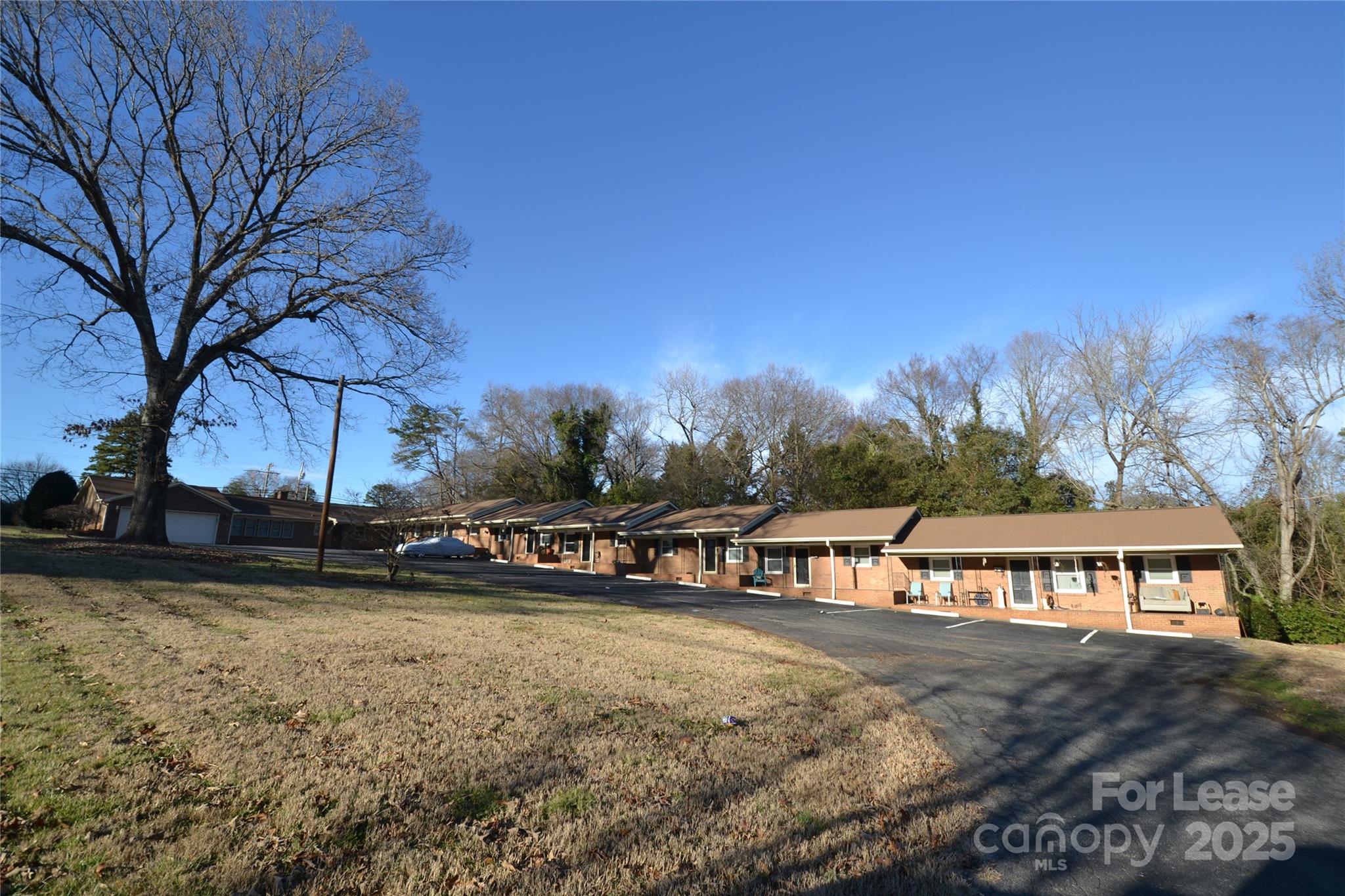 107 Ferstl Avenue Belmont, NC 28012 - Photo 1 of 15 a view of a house with a yard and sitting area