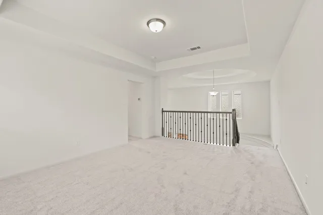 a view of a livingroom with a floor to ceiling window