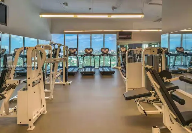 a view of a room with gym equipment
