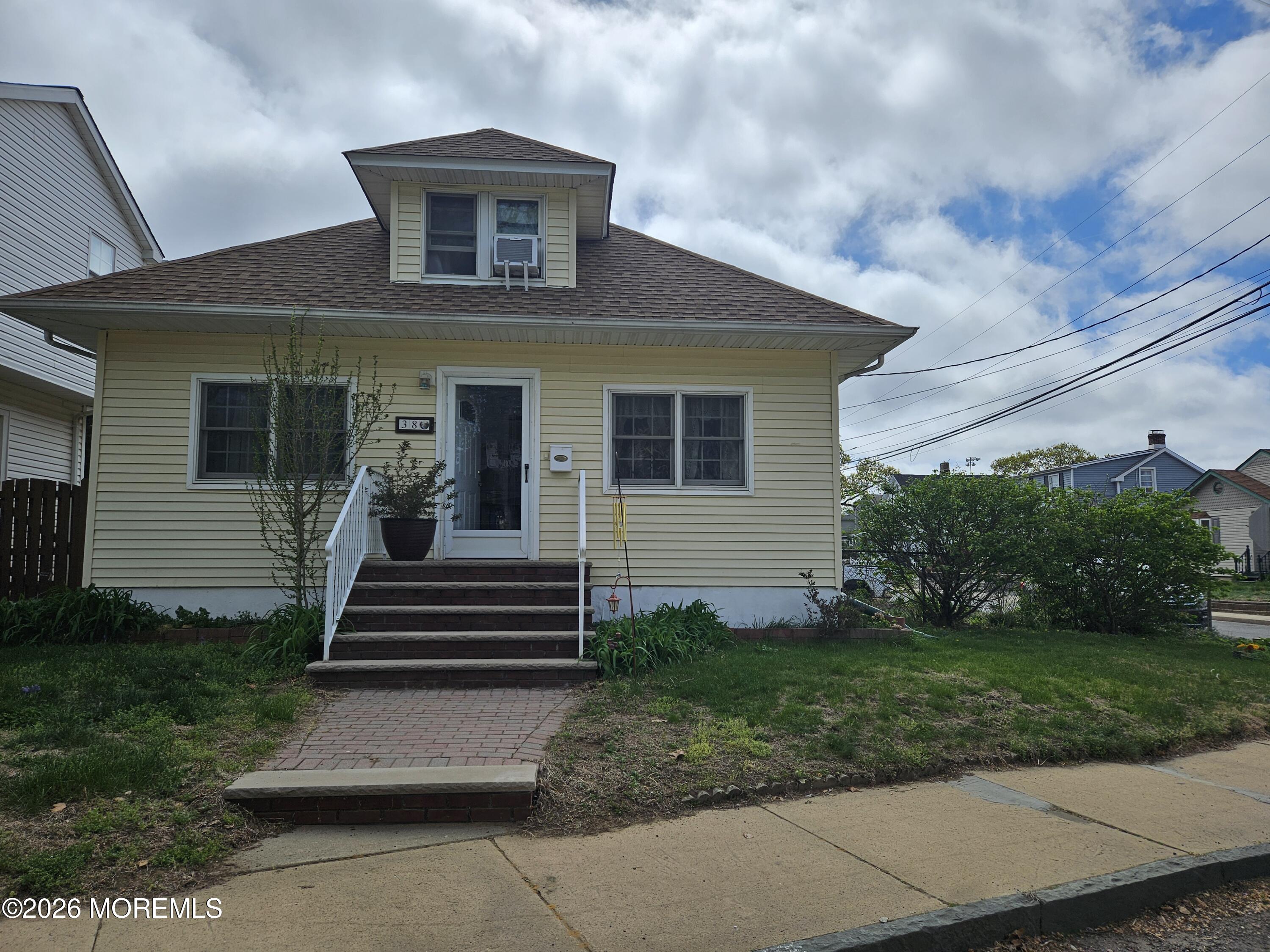 38 Walnut Street Keyport, NJ 07735 - Photo 19 of 19 a front view of a house with a yard