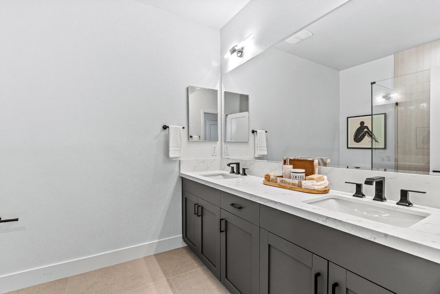 943 Woodside Road Redwood City, CA 94061 - Photo 21 of 30 a bathroom with a sink and a mirror